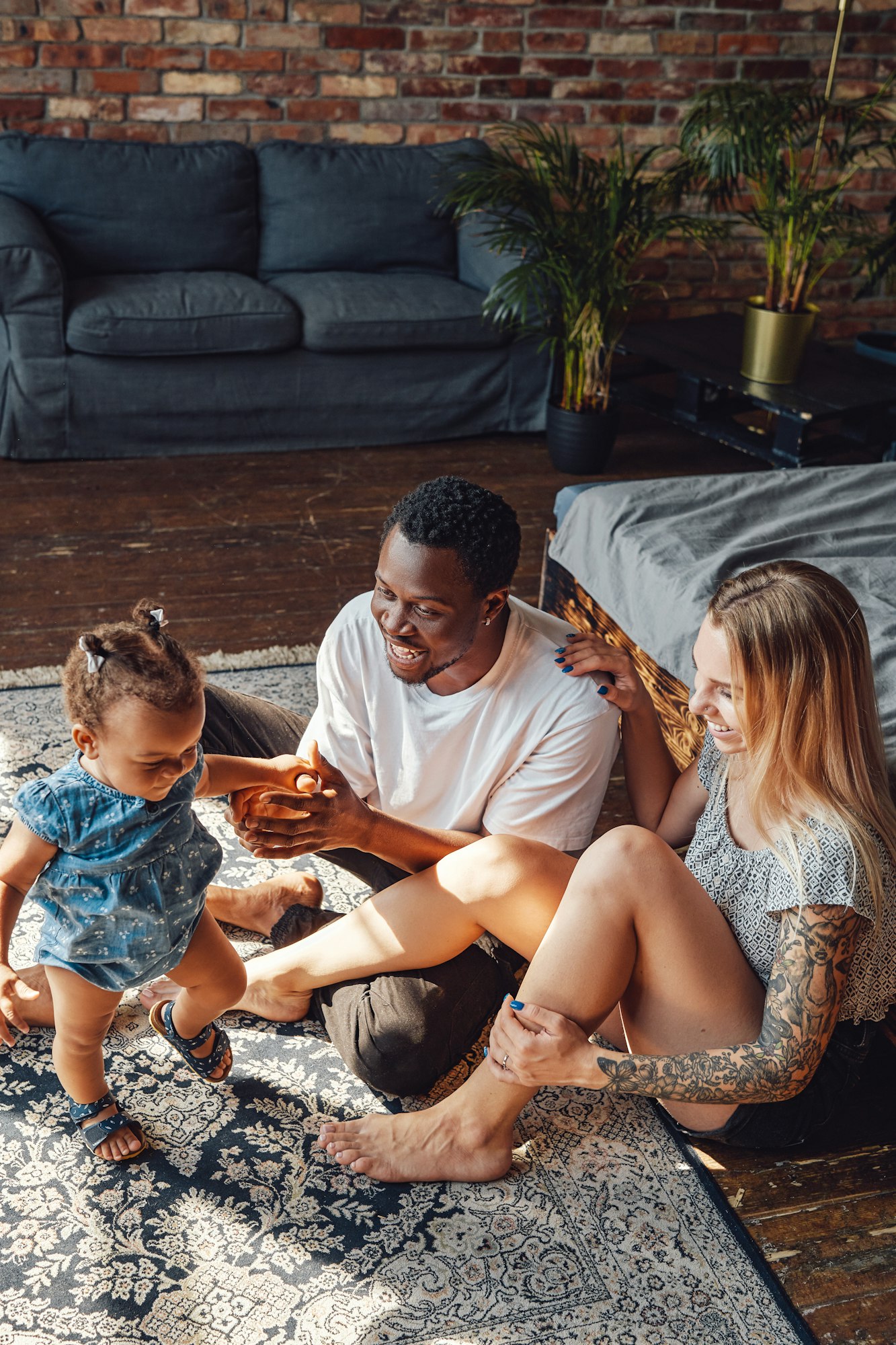 Happy mixed race family having fun together at home