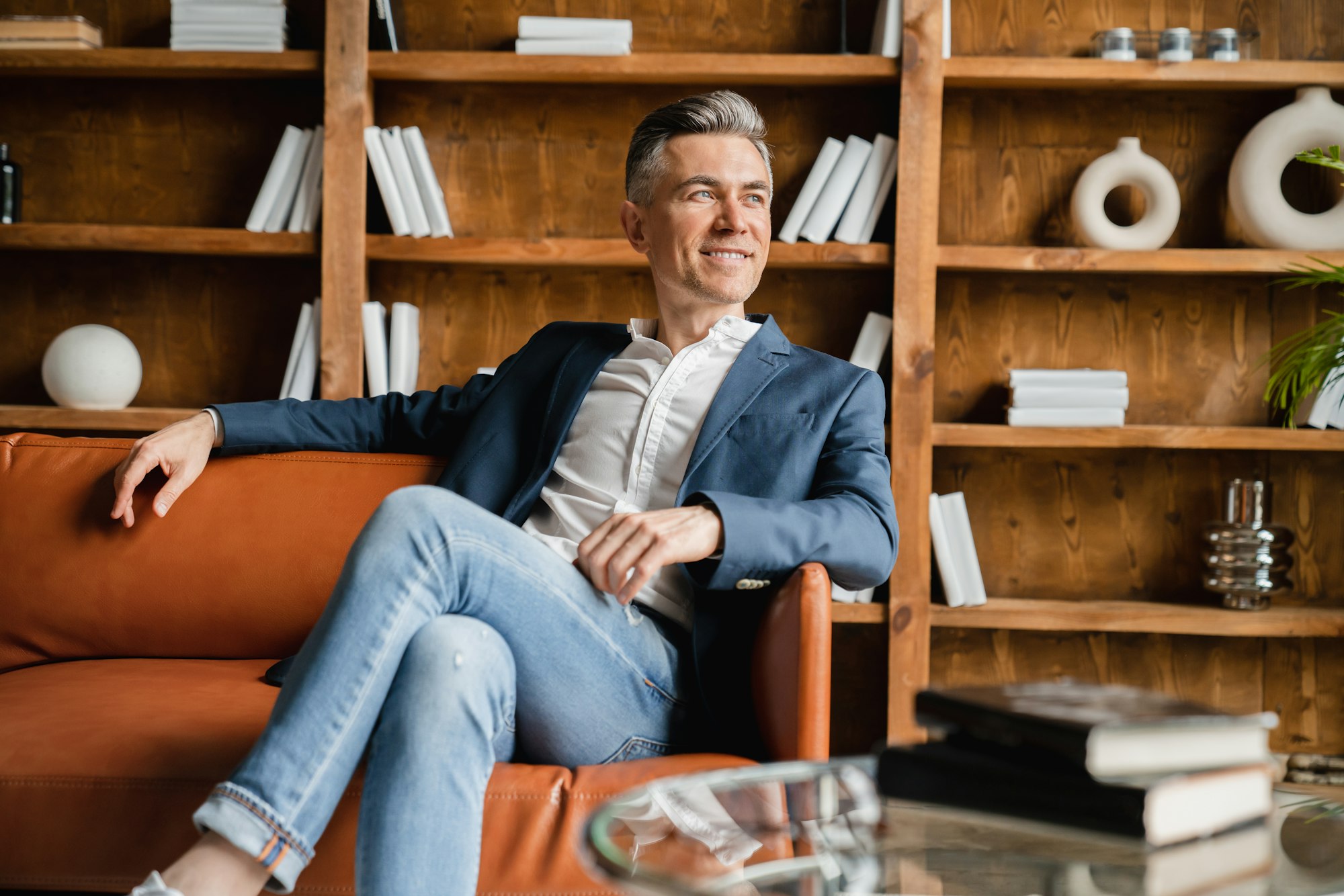 Wealth prosperity and fame. Boss ceo resting sitting on the sofa after hard-working day in office